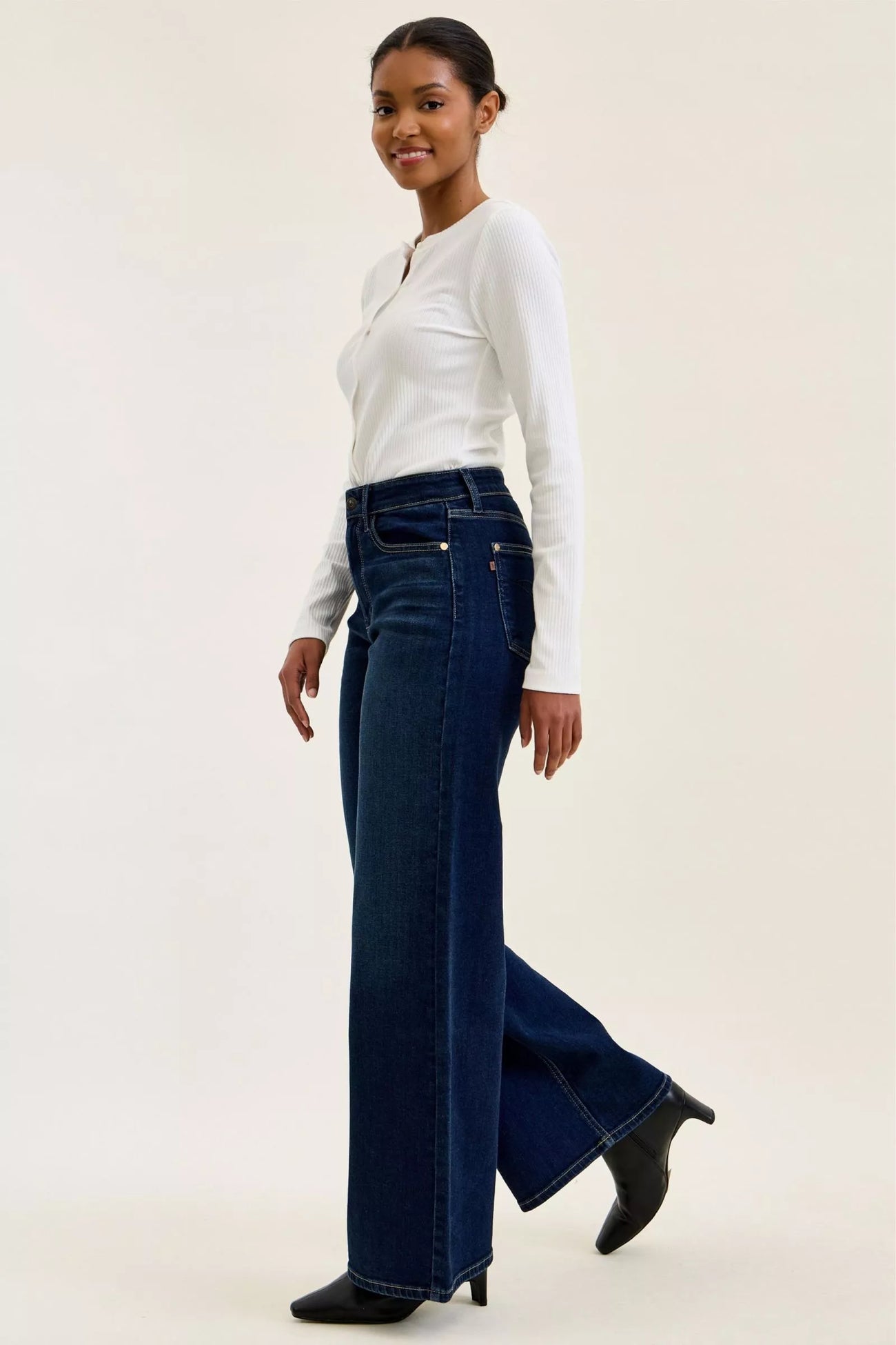 Front view of the DK Judy Blue High-Waisted Wide-Leg Dark Wash Jeans, styled with polished boutique styling for day-to-night outfits, made for women who want easy layering.