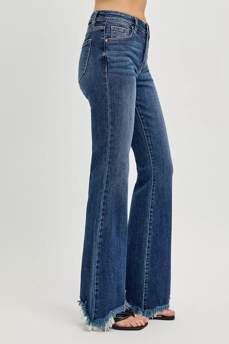 Neckline detail of the DARK RISEN Full Size Mid Rise Flare Frayed Hem Jeans Plus Size, styled with polished boutique styling for day-to-night outfits, made for women who want easy layering.