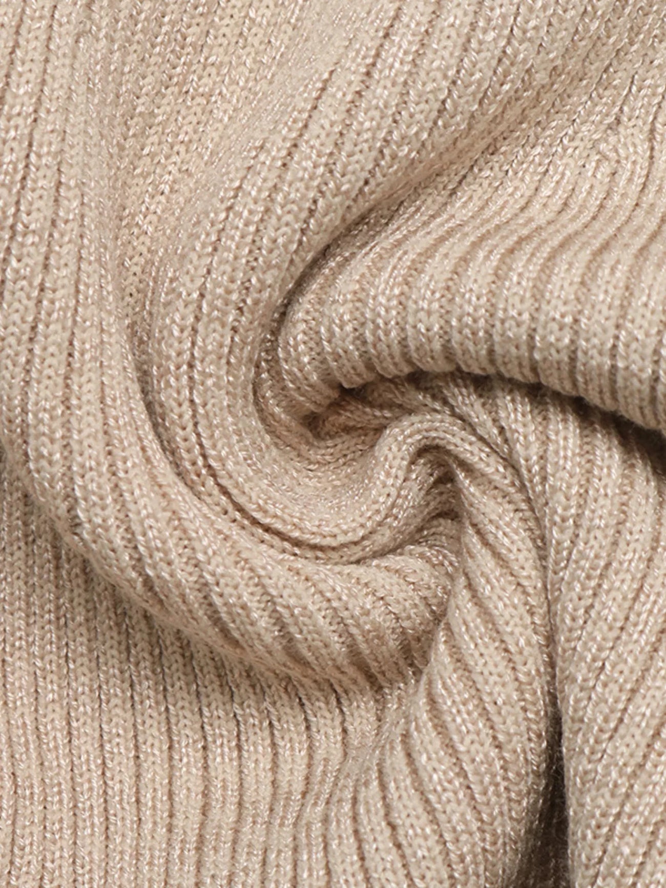 Fabric detail of the Khaki Ribbed Mock Neck Flare Sleeve Sweater Dress, styled with feminine boutique styling for dinners, travel, and events, made for women who want elegant styling.