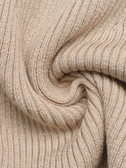 Fabric detail of the Khaki Ribbed Mock Neck Flare Sleeve Sweater Dress, styled with feminine boutique styling for dinners, travel, and events, made for women who want elegant styling.