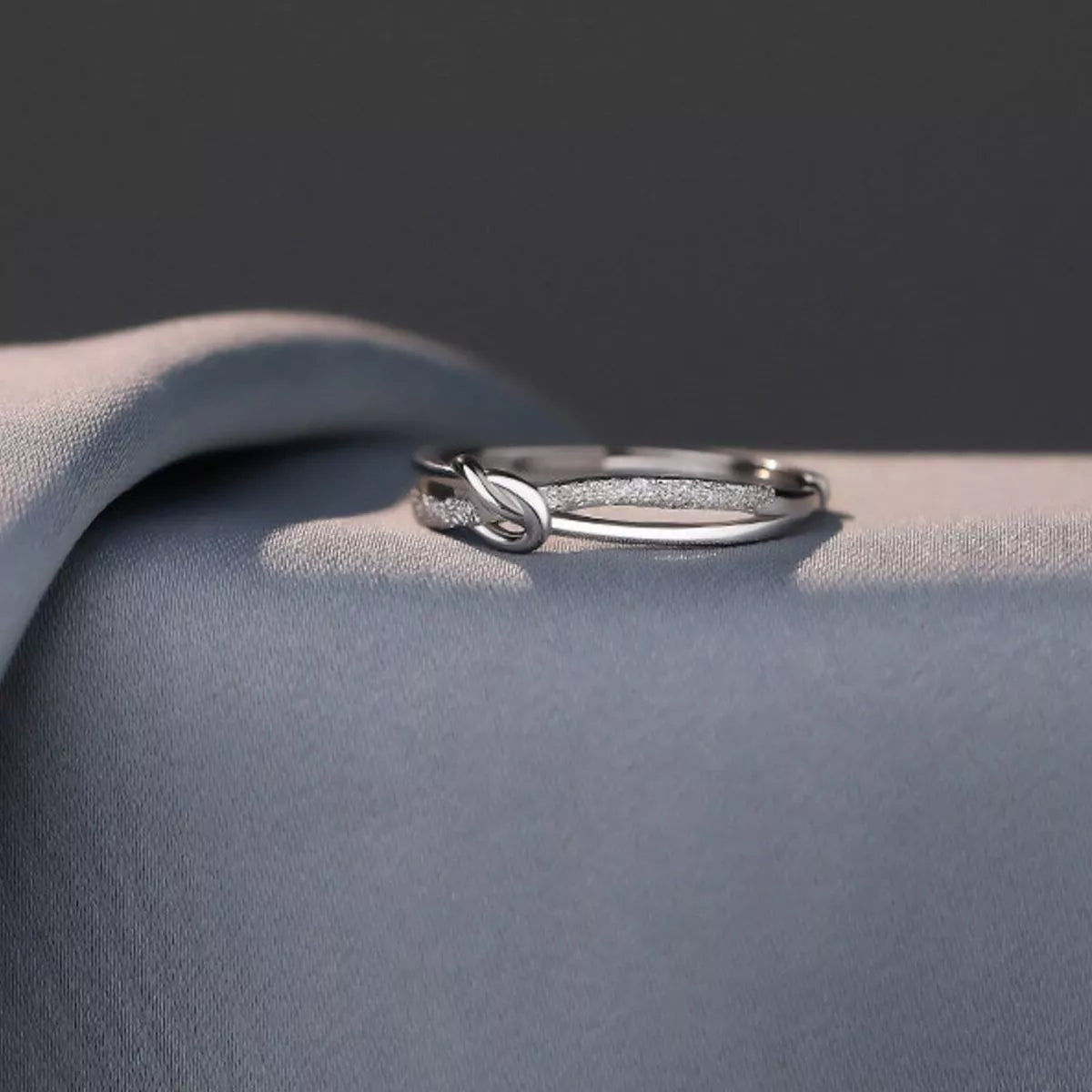 Stacked styling view of the Women's Silver Minimalist 925 Sterling Knot Ring for Everyday Styling & Gifting, styled with delicate sparkle for daily wear and gifting, made for women who want refined jewelry.