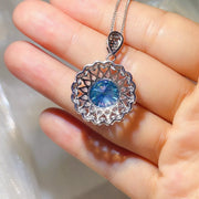 Shine detail of the Royal Blue 5 Carat 925 Sterling Silver Moissanite Pendant Necklace, styled with layered jewelry for everyday styling and gifting, made for women who want refined neckline detail.