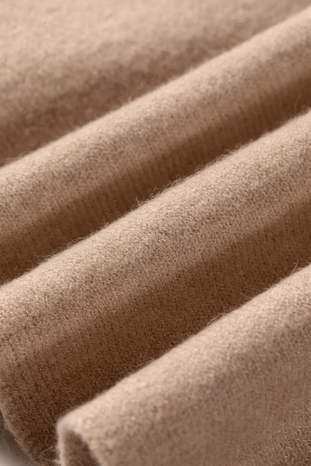 Side view of the Taupe Ribbed Trim High Neck Short Sleeve Casual Sweater, styled with polished comfort for work, travel, and everyday wear, made for women who want repeat outfit options.