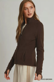 Side view of the COCO BROWN Umgee Soft Fleece Full Zip Jacket With Pockets, styled with polished boutique styling for day-to-night outfits, made for women who want easy layering.