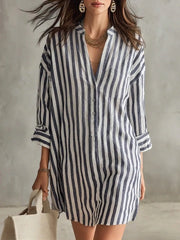 Back view of the Black Full Size Striped 3/4 Sleeve Shirt Dress Plus Size, styled with feminine boutique styling for dinners, travel, and events, made for women who want elegant styling.