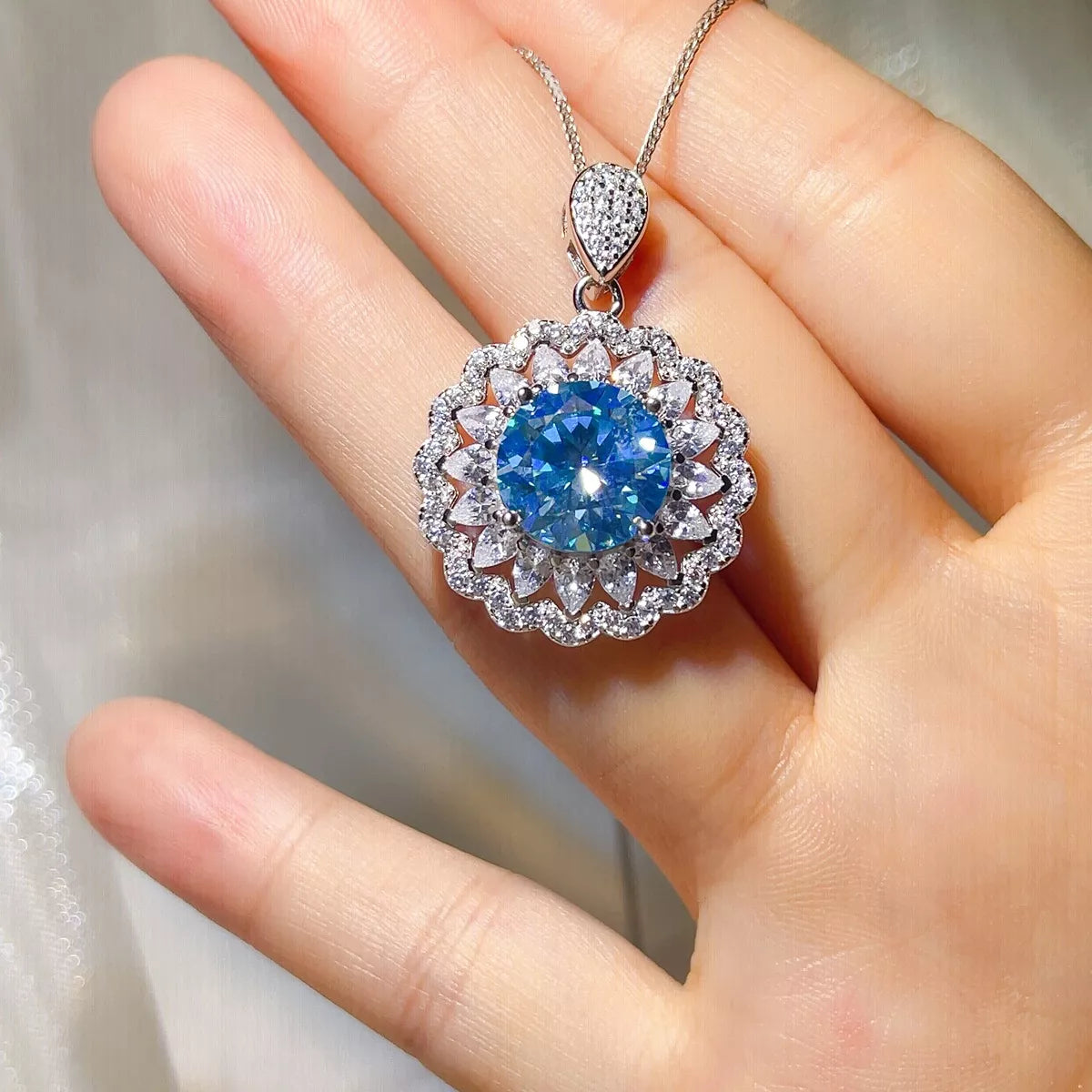 Layered styling view of the Royal Blue 5 Carat 925 Sterling Silver Moissanite Pendant Necklace, styled with layered jewelry for everyday styling and gifting, made for women who want refined neckline detail.