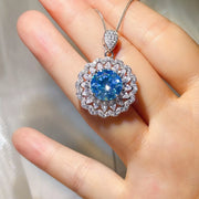 Layered styling view of the Royal Blue 5 Carat 925 Sterling Silver Moissanite Pendant Necklace, styled with layered jewelry for everyday styling and gifting, made for women who want refined neckline detail.