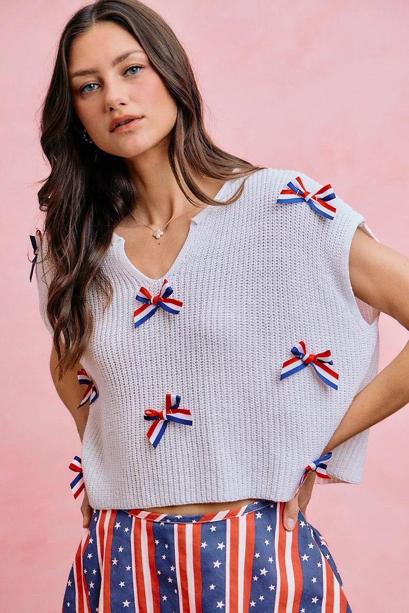 Front view of the OFF WHITE SO ME 4th Of July Ribbon Trimmed Dolman Sweater Top, styled with polished boutique styling for day-to-night outfits, made for women who want easy layering.