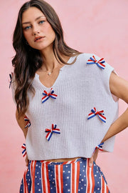 Front view of the OFF WHITE SO ME 4th Of July Ribbon Trimmed Dolman Sweater Top, styled with polished boutique styling for day-to-night outfits, made for women who want easy layering.