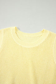 Fabric detail of the Light Yellow Solid Color Cropped Knit Knot Back Cutout Sweater Tank, styled with polished boutique styling for day-to-night outfits, made for women who want easy layering.