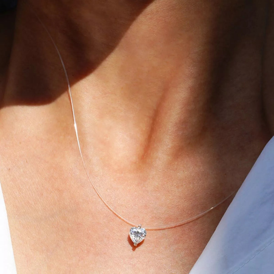 Front view of the Silver Heart Necklace, styled with layered jewelry for everyday styling and gifting, made for women who want refined neckline detail.