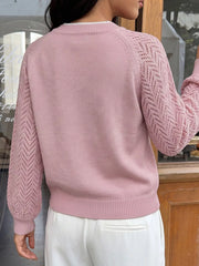 Fabric detail of the Pink V-Neck Openwork Long Sleeve Sweater, styled with polished boutique styling for day-to-night outfits, made for women who want easy layering.