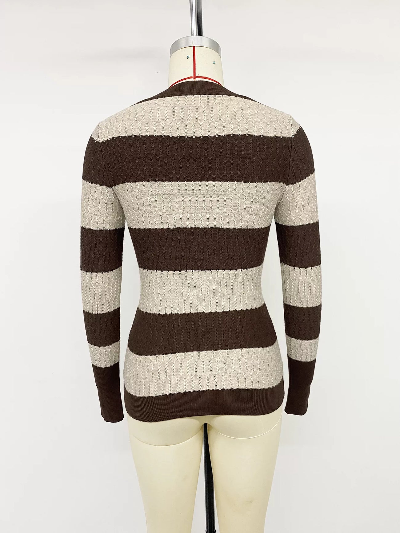 Front view of the Coffee Brown Striped V-Neck Knit Top, styled with polished boutique styling for day-to-night outfits, made for women who want easy layering.