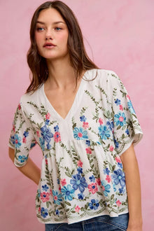 Bundle outfit view of the OFF WHITE/BLUE Women's Elegant Floral So Me Embroidered Baby Doll Blouse for Layering & Everyday Outfits, styled with polished boutique styling for day-to-night outfits, made for women who want easy layering.